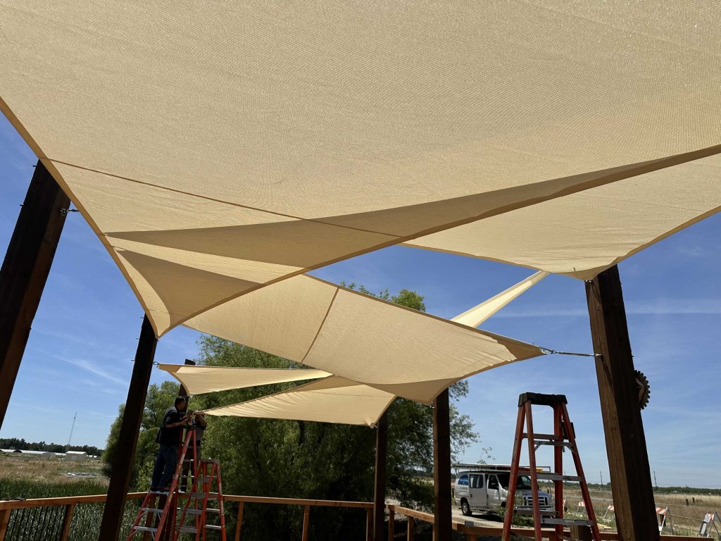 Sgade Sails using Commercial 95 fire retardant shade fabric 
